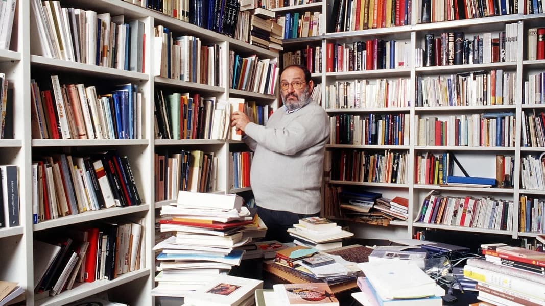[Umberto Eco in his library]
